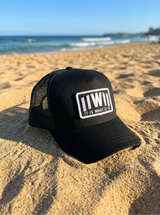 IIWII Founder's Edition Cap on beach sand
